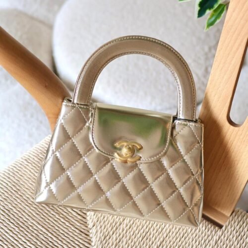 Chanel Mini Kelly 23K Lambskin Top Handle Nano Bag for women in Dubai