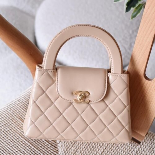 Chanel Mini Kelly 23K Lambskin Top Handle Nano Bag for women in Dubai
