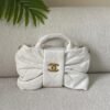 Chanel Mini Shiny Lambskin CC Logo Gold-Tone Metal Bow Bag in Dubai