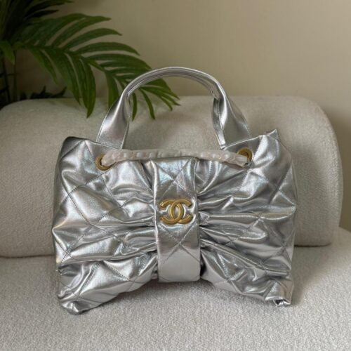 Chanel Mini Shiny Lambskin CC Logo Gold-Tone Metal Bow Bag in Dubai