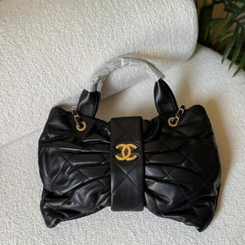 Chanel Mini Shiny Lambskin CC Logo Gold-Tone Metal Bow Bag in Dubai